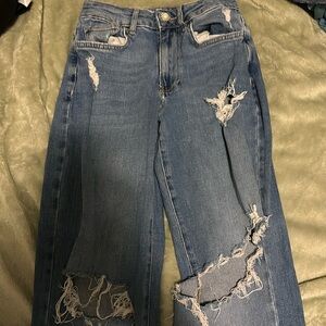 Forever 21 worn a couple times size 24 ripped jeans with pearl button
